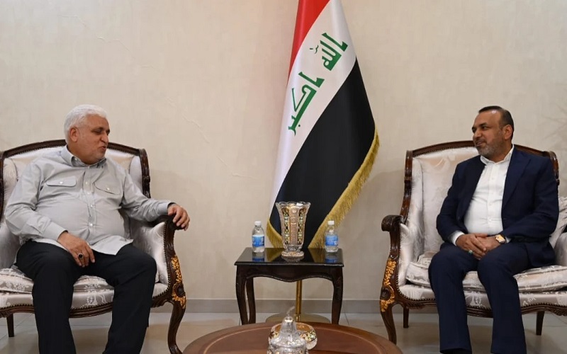وزير العمل العراقي السابق أحمد الأسدي ورئيس هيئة الحشد الشعبي فالح الفياض
